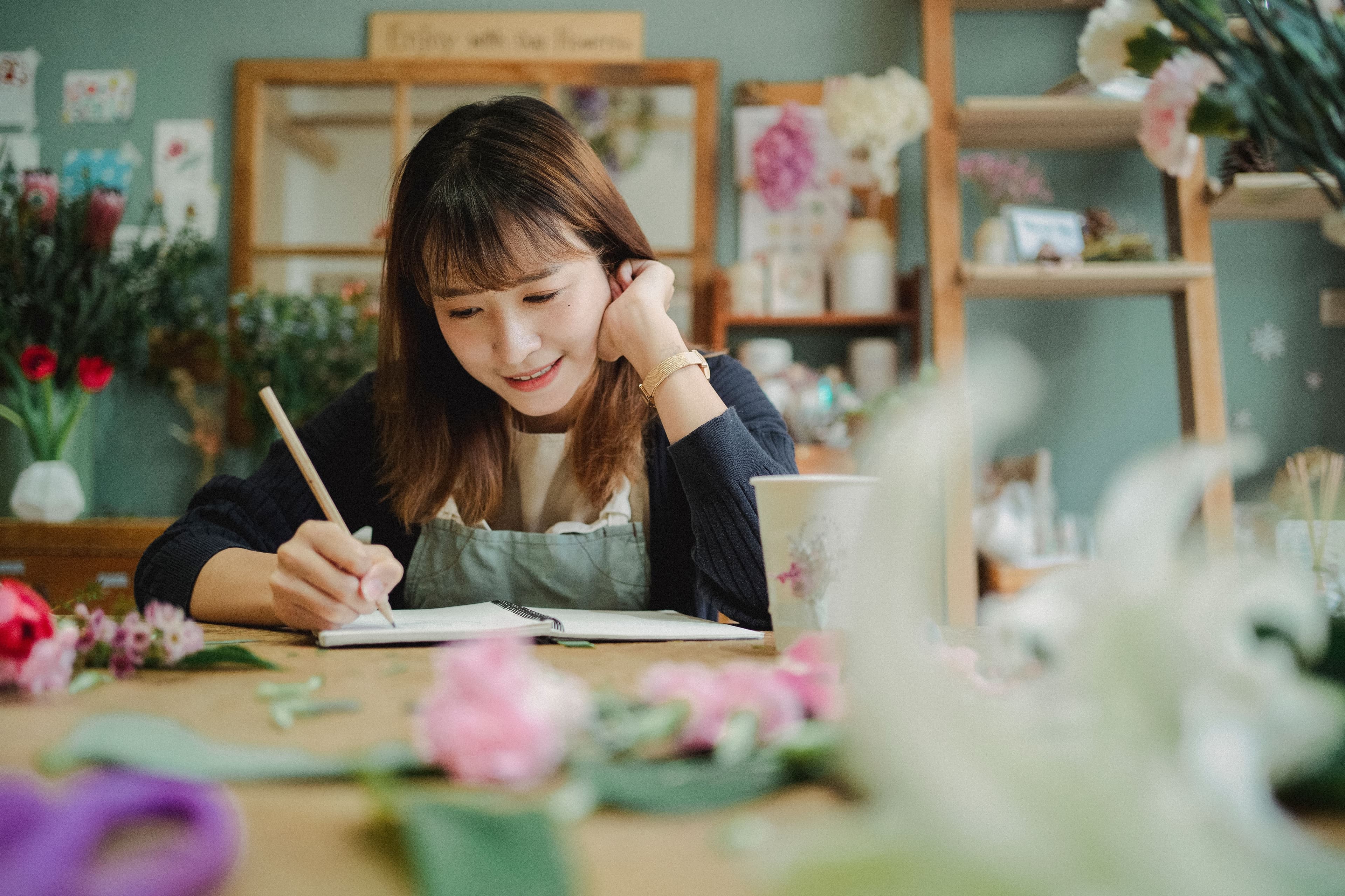 A small business owner preparing an order sold through their bio link